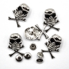 Череп з чорними очами та кістками на заклепці 24х17 мм (5 штук)